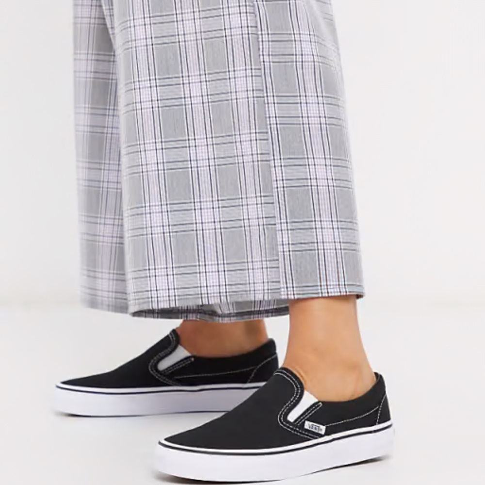 Vans Classic Black and White Slip-Ons